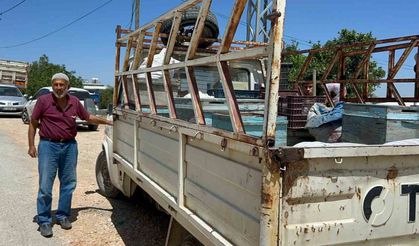 Alevlerin arasına arılarını kurtarmaya geldi